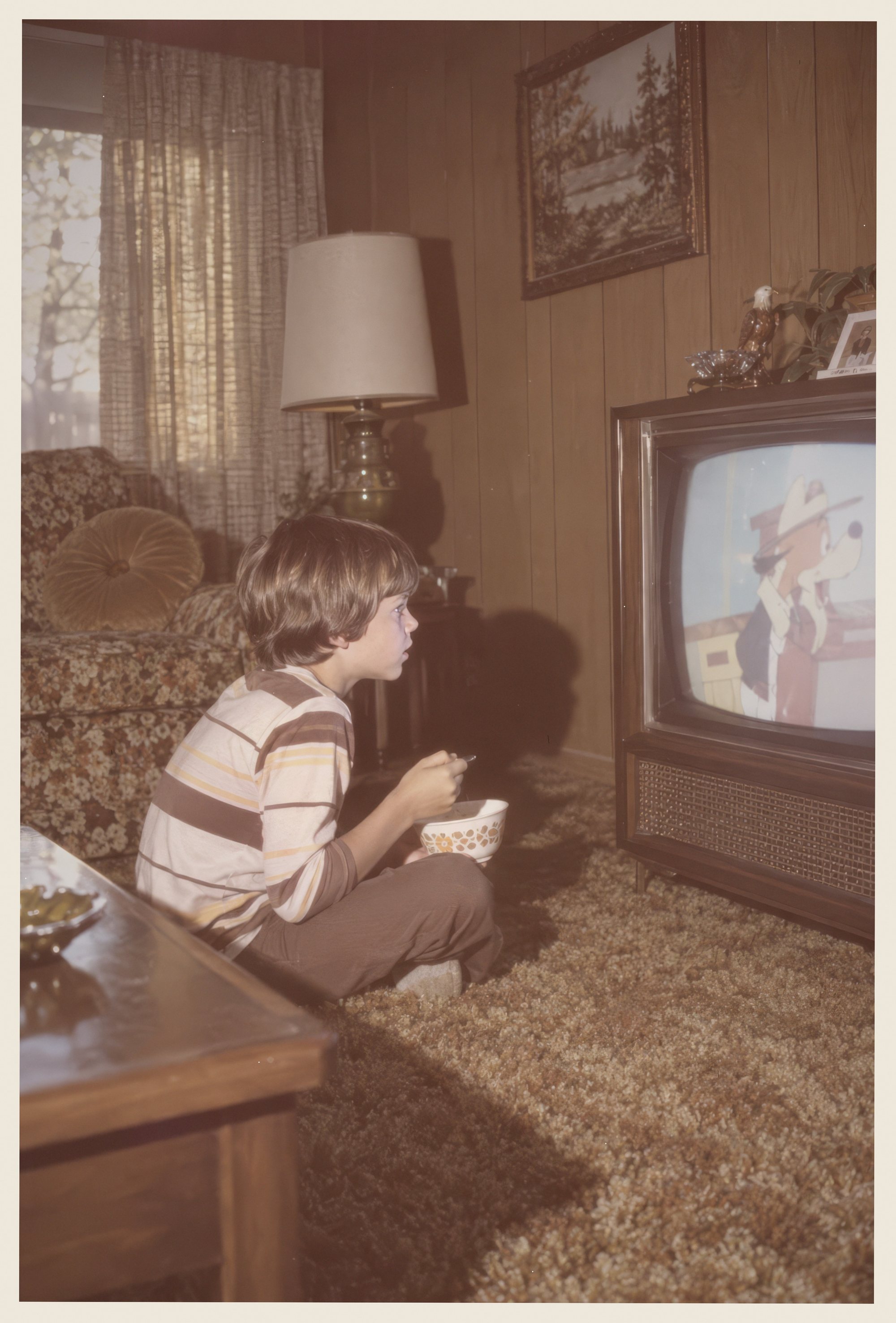 Kid alone in front of a console TV, 1977